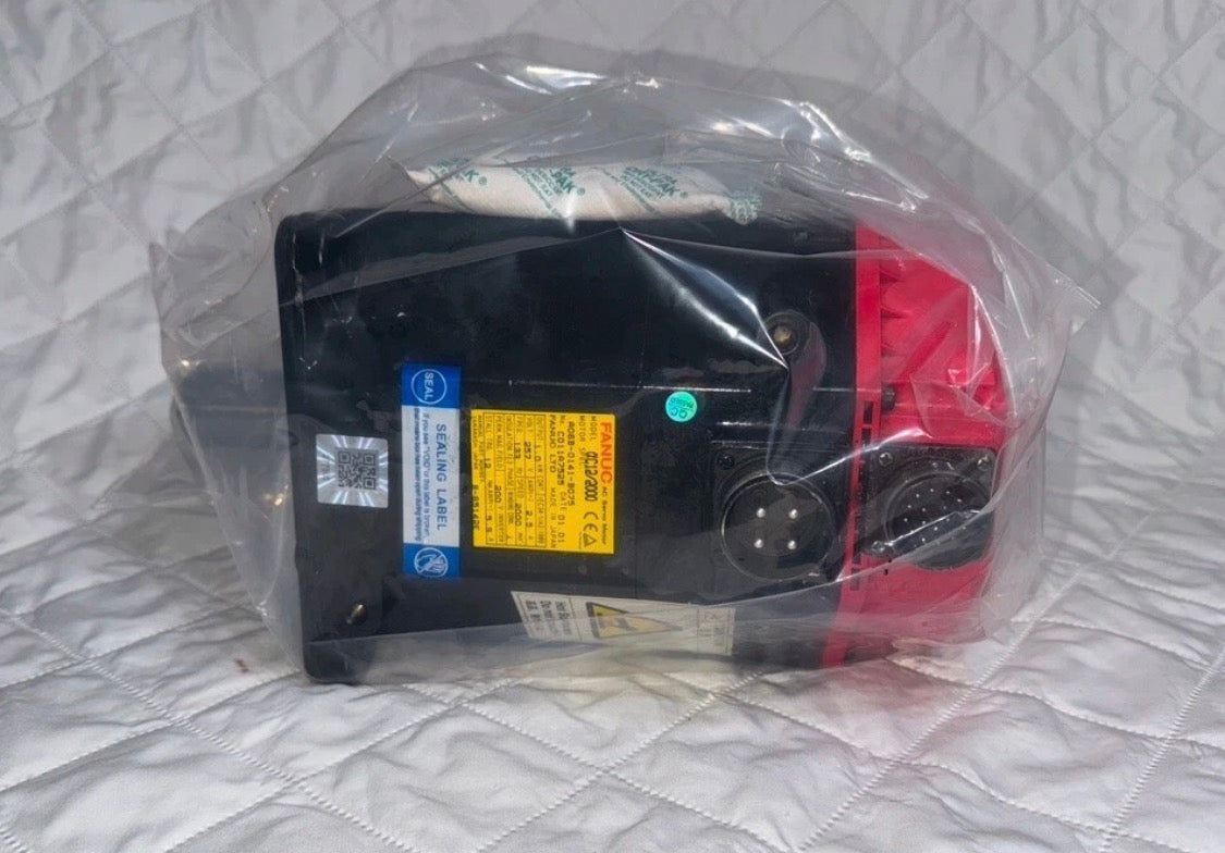 Fanuc A06B-0141-B075 AC MOTOR AC12/2000 1.0 Kw 2.5 A 257V B-65142E